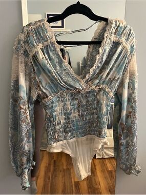 Free People silk blue floral bodysuit with lace details (size small)